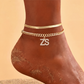 💛 Nőknek készült finom réteges arany monogramos bokakarkötő – Elegáns, divatos – Utánvét ✨
